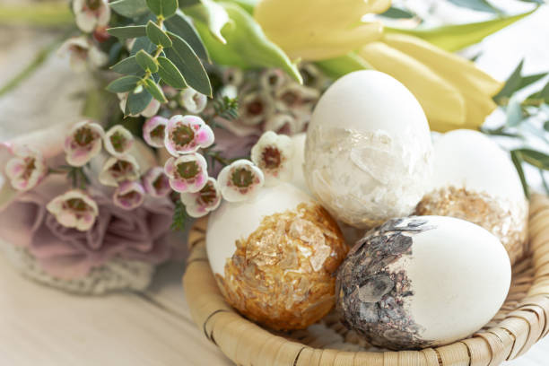 istock Easter composition with decorative eggs and flowers, close-up. 1473330910