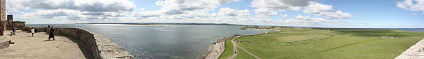 Panoramic view of bay around Lindisfarne Castle stock photo