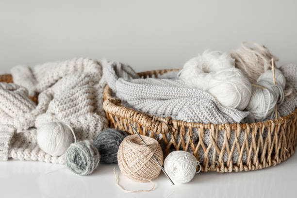 istock Basket with yarn close-up, threads for knitting. 1473334319