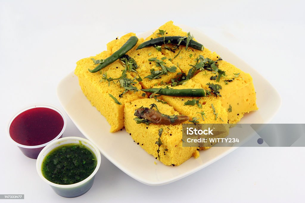 indian gujarati snack dhokla snack of guajarat in india Chili Pepper Stock Photo