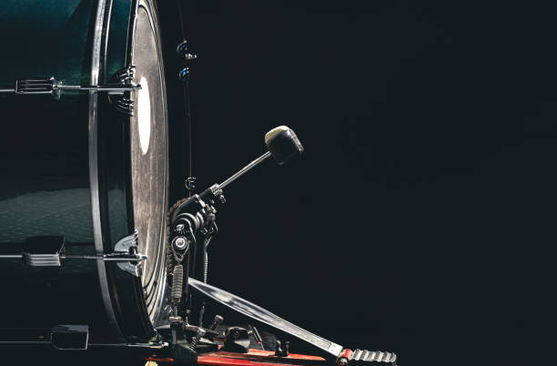 istock Bass drum with pedal, musical instrument on black background. 1473337471