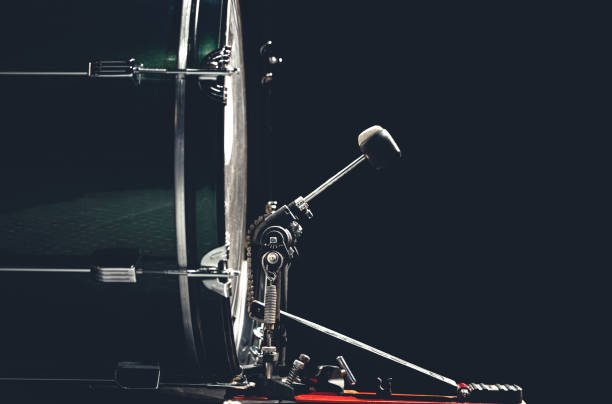 istock Bass drum with pedal, musical instrument on black background. 1473337472