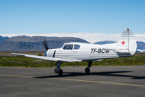 Hornafjordur Iceland - June 25.2022: TF-BCW Private Yakolev Yak-18T airplane taxiing at Hornafjordur airport