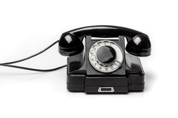 istock Vintage black telephone  on a white bachground. 1473338487