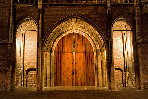 Front entrance of the famous New church in Delft, the Netherlands. This church situated on the Market square - center of the city. Here you can see this church: http://www.istockphoto.com/stock-photo-9415303-night-church.php