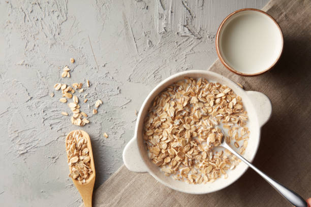 istock Rolled oats in a bowl and milk 1473338899