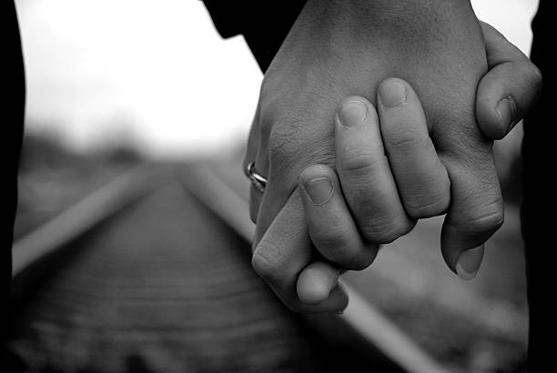 istock Couple holding hands, man and wife 147334545