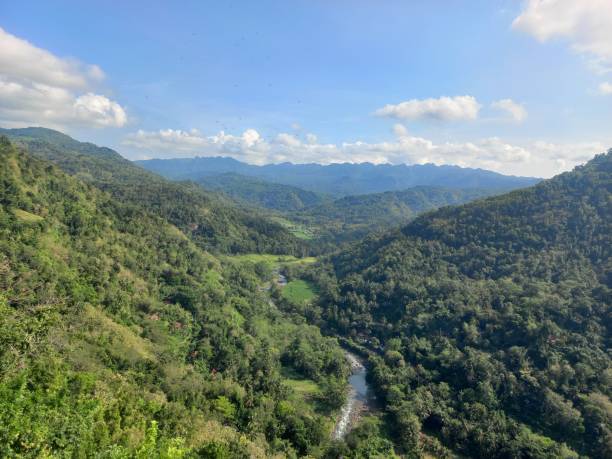 istock A green hill with a small river in the summer 1473348296