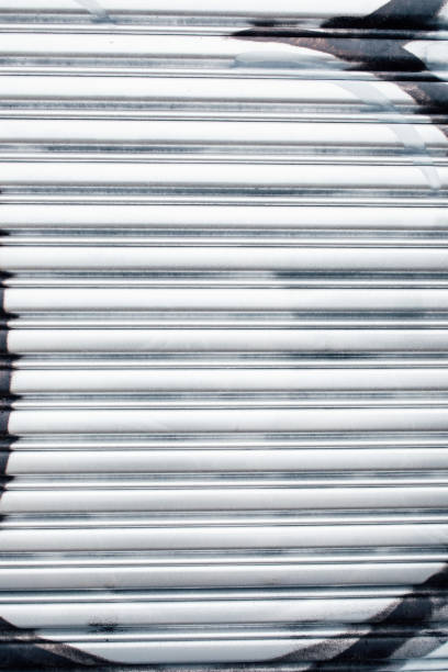 istock silver painted corrugated metal garage door 1473357403