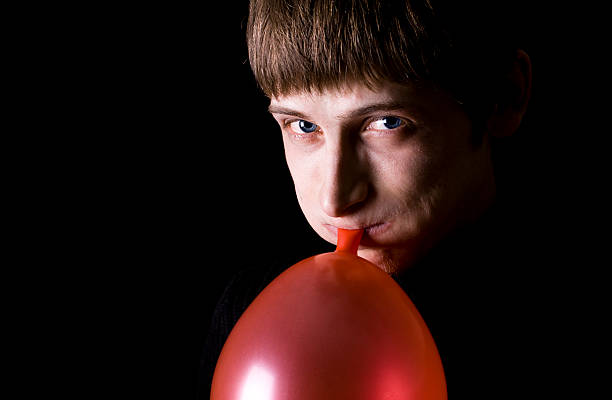 Boy with a balloon stock photo