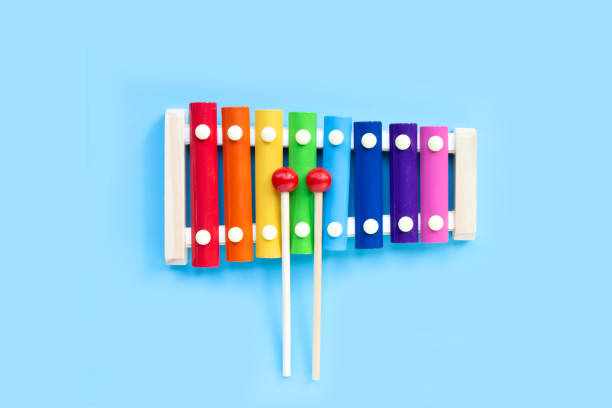 istock Colorful xylophone on blue background. 1473368795