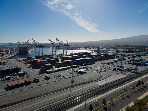 Container Shipyard with Shipping Containers and Cranes at San Pedro, Los Angeles California on a Sunny Afternoon