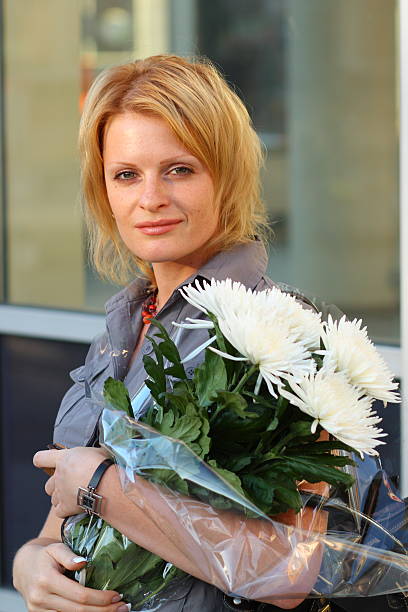 Woman and flower stock photo