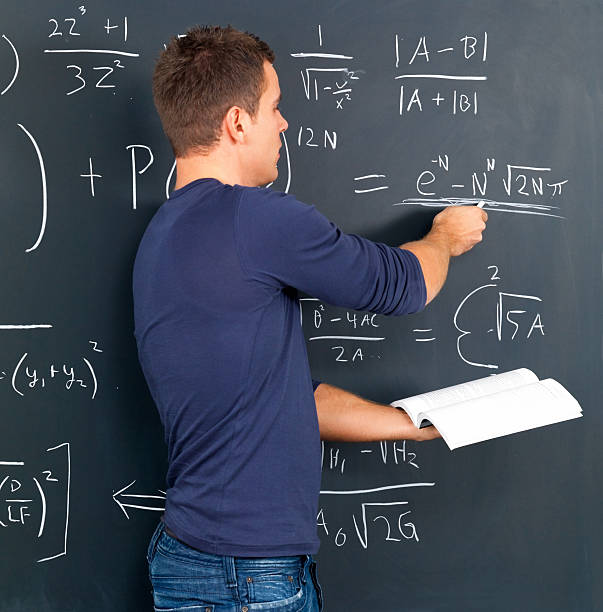 istock Close-up of student solving a sum on the blackboard 147337144