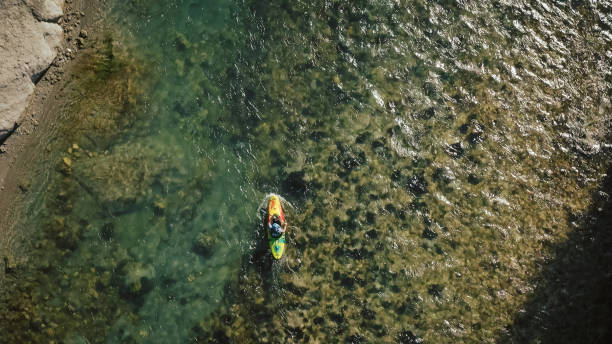 istock Kayak on a river, aerial shot 1473373548