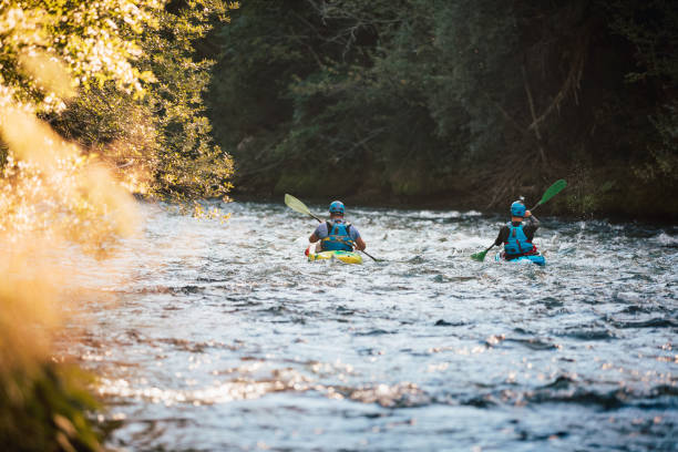 istock Whitewater kayaker paddling on river 1473374072
