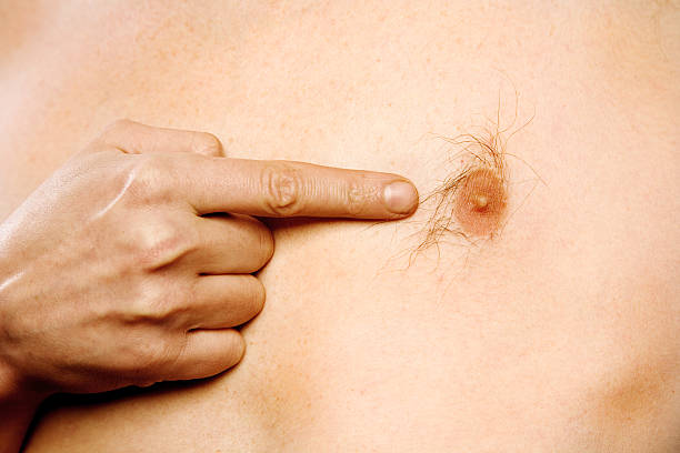 finger showing on the nipple stock photo