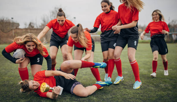 istock Female rugby team won a trophy 1473377638