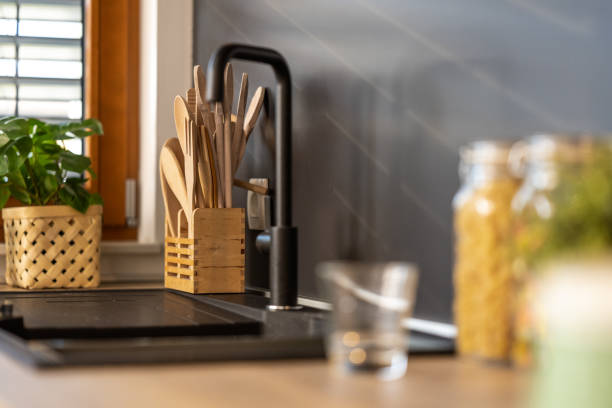 istock Empty kitchen interior wooden utensils and faucet 1473378744