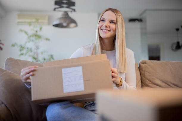 istock Young entrepreneur is sending a package to a customer 1473379266
