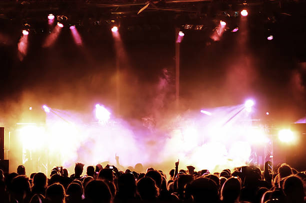 istock Silhouettes of a concert crowd 147338403