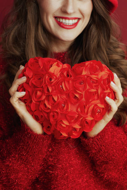 istock Closeup on woman with red heart 1473385229