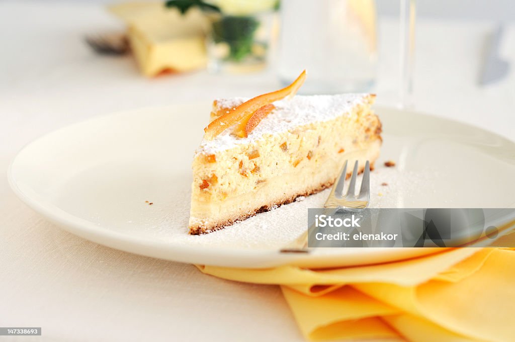 Slice of Baked ricotta cake A slice of Baked ricotta cake with candied peel Baked Stock Photo