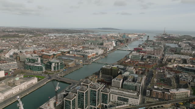 Dublin Ireland aerial view of river Liffey and city center, aerial view of Dublin skyline and Samuel Beckett Bridge, aerial view of Dublin city, Ireland