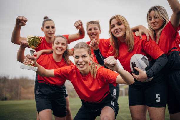 istock Rugby players celebrating a trophy 1473396850