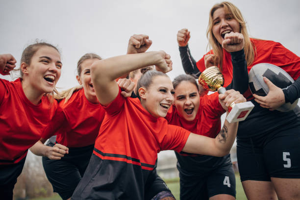 istock Rugby players celebrating a trophy 1473397611