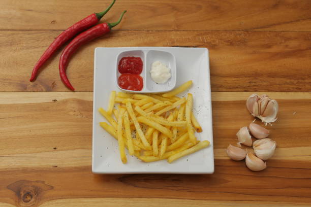 istock French fries with tomato sauce 1473409354