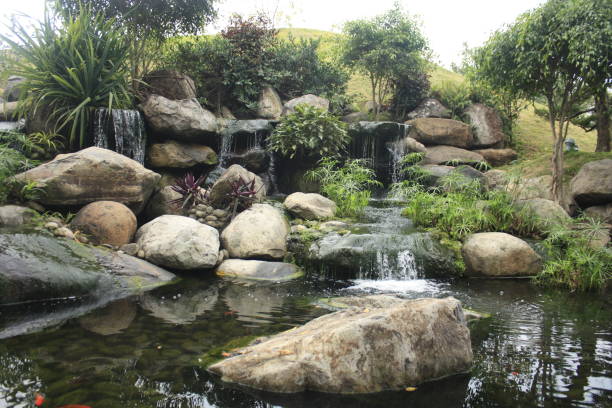 istock Asian theme garden with pond and memorial 1473410314