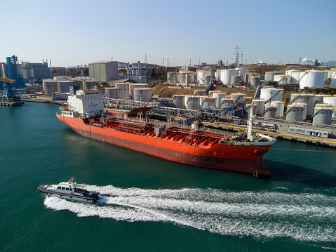 Aerial view of chemicals gas ship. Gas or chemicals carrier, tanker at Ulsan harbor in east sea, in the industrial district of in Nam-gu in Ulsan, South Korea.