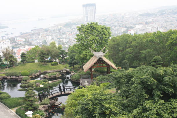 istock Asian theme garden with pond and memorial 1473411329