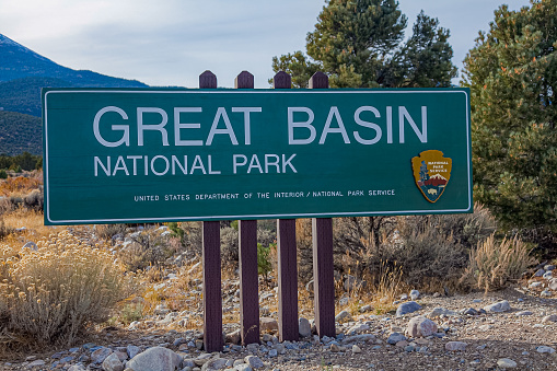 Entrance sign to Great Basin National Park during the peak fall season.
