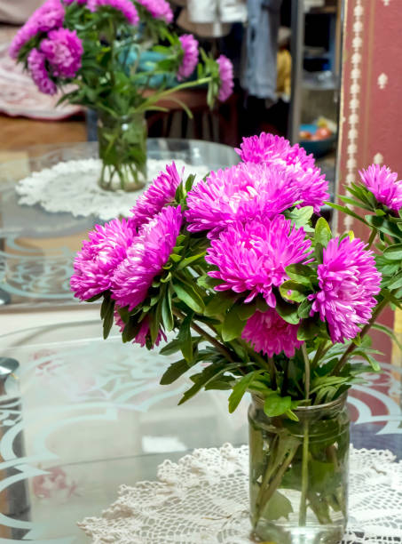 istock pink bouquet of asters in a vase 1473415805