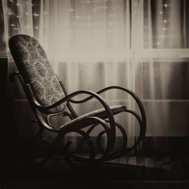 istock A rocking chair by the window 1473416872