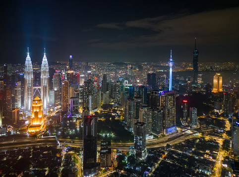 Bukit Bintang, Kuala Lumpur, Malaysia - Nov 29 2022: The city's nightlife of iconic four tall building in night