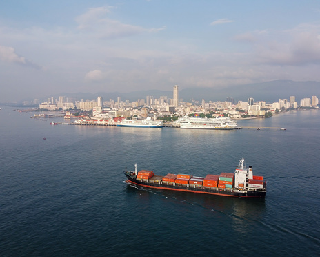 George Town, Penang, Malaysia - Apr 13 2022: Container ship arrive the Penang Sea in morning