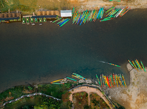 Scenic aerial view of long-tail boats on the river