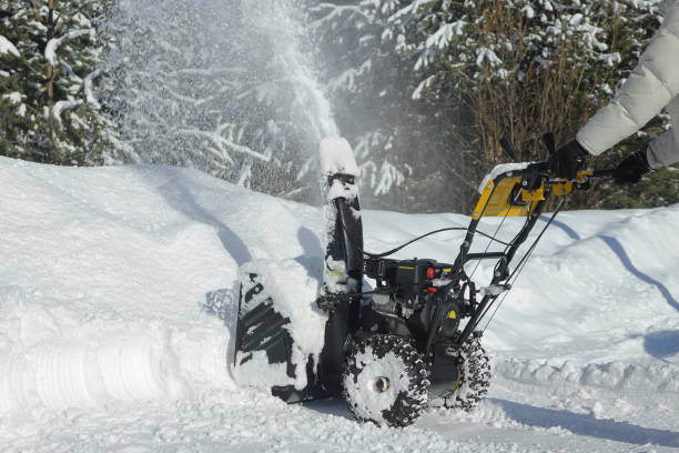 istock Snow removal courtyard by snow blower after heavy snowfall. 1473427363