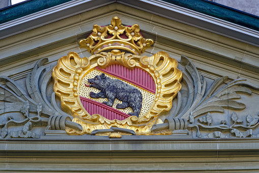 Innsbruck, Austria - February 26, 2023: Hofburg, former Habsburg palace, coat of arms on top. It is one of three most significant cultural buildings in the country