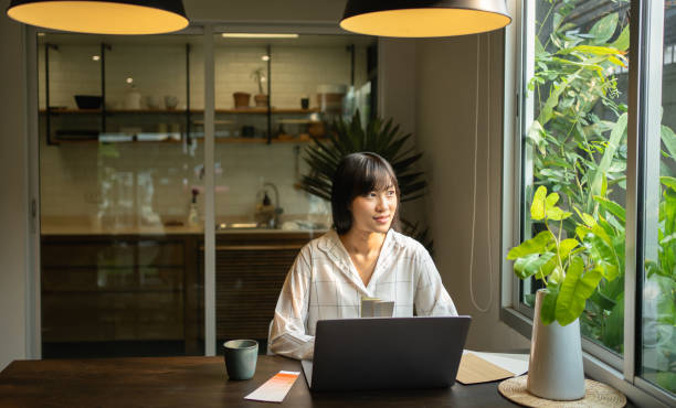 istock Asian woman work from home. 1473431627
