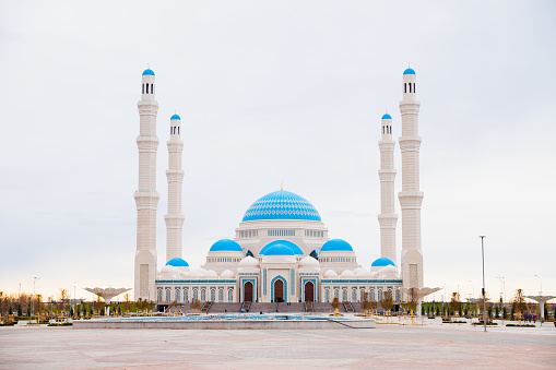 Central mosque of Astana city with four minarets, cathedral mosque. Astana Nur-Sultan, Kazakhstan - 10.24.2022.