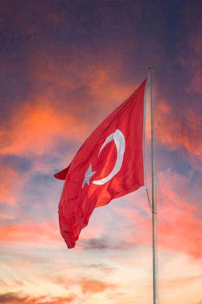istock Turkish flag. Turkey national flag. Turkish flag at sunset 1473433690