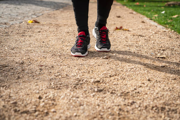 istock Men running feet with sport shoes. 1473433834