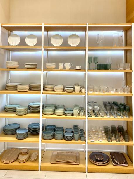 istock Wood shelves with plates and glasses 1473433896