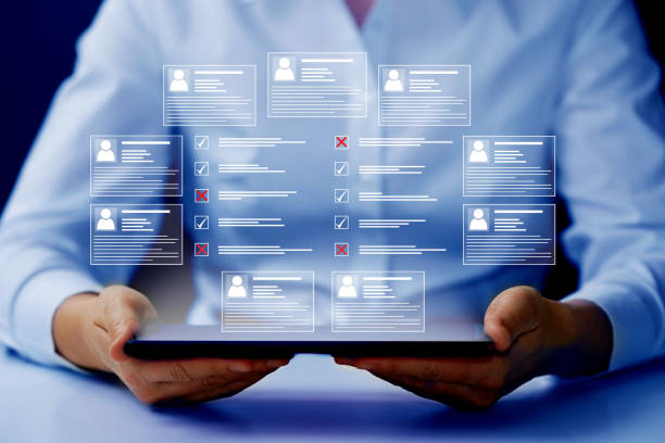 istock Human resources and management concept. Employee must complete the online survey form. Marked checklist on a clipboard. 1473435103