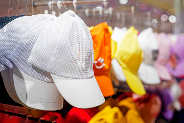 istock multi-colored summer caps in the store. Summer is coming 1473435478