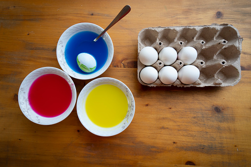 Coloring eggs with dye for Easter